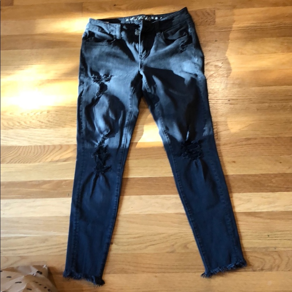 Black stretch ripped jeans